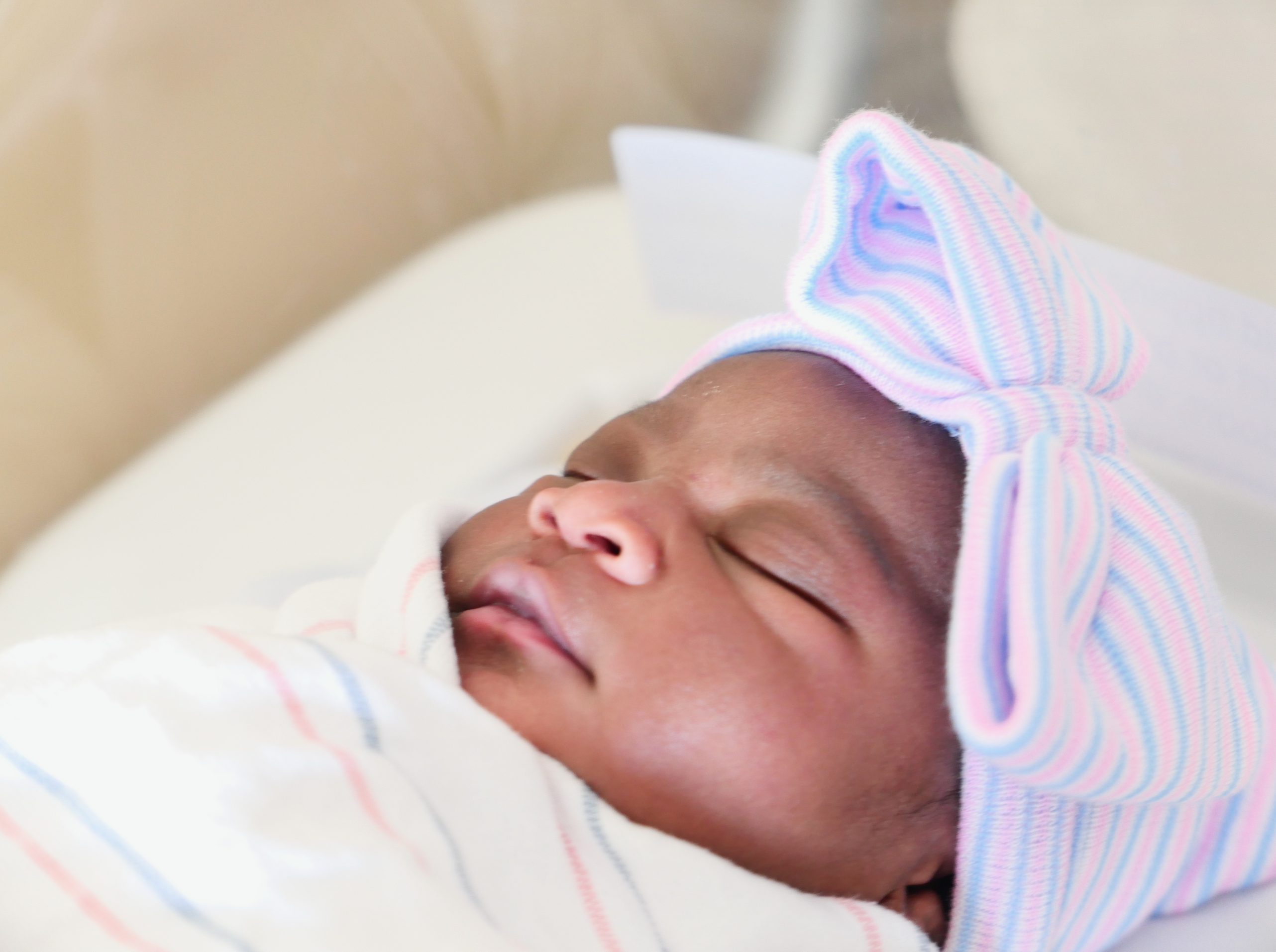 Lyra Olympia Millwood sleeping as a newborn